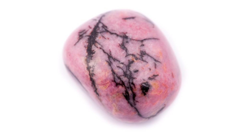 Close up of polished rhodonite stone