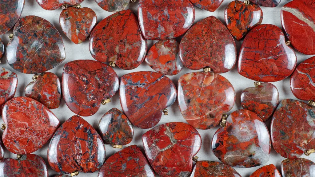 Close up of jasper stone heart pendants
