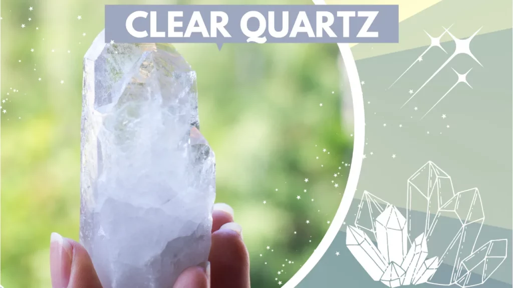 Hand holding clear quartz crystal